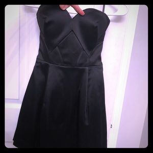 Bebe black mini-dress, New Year’s Eve.